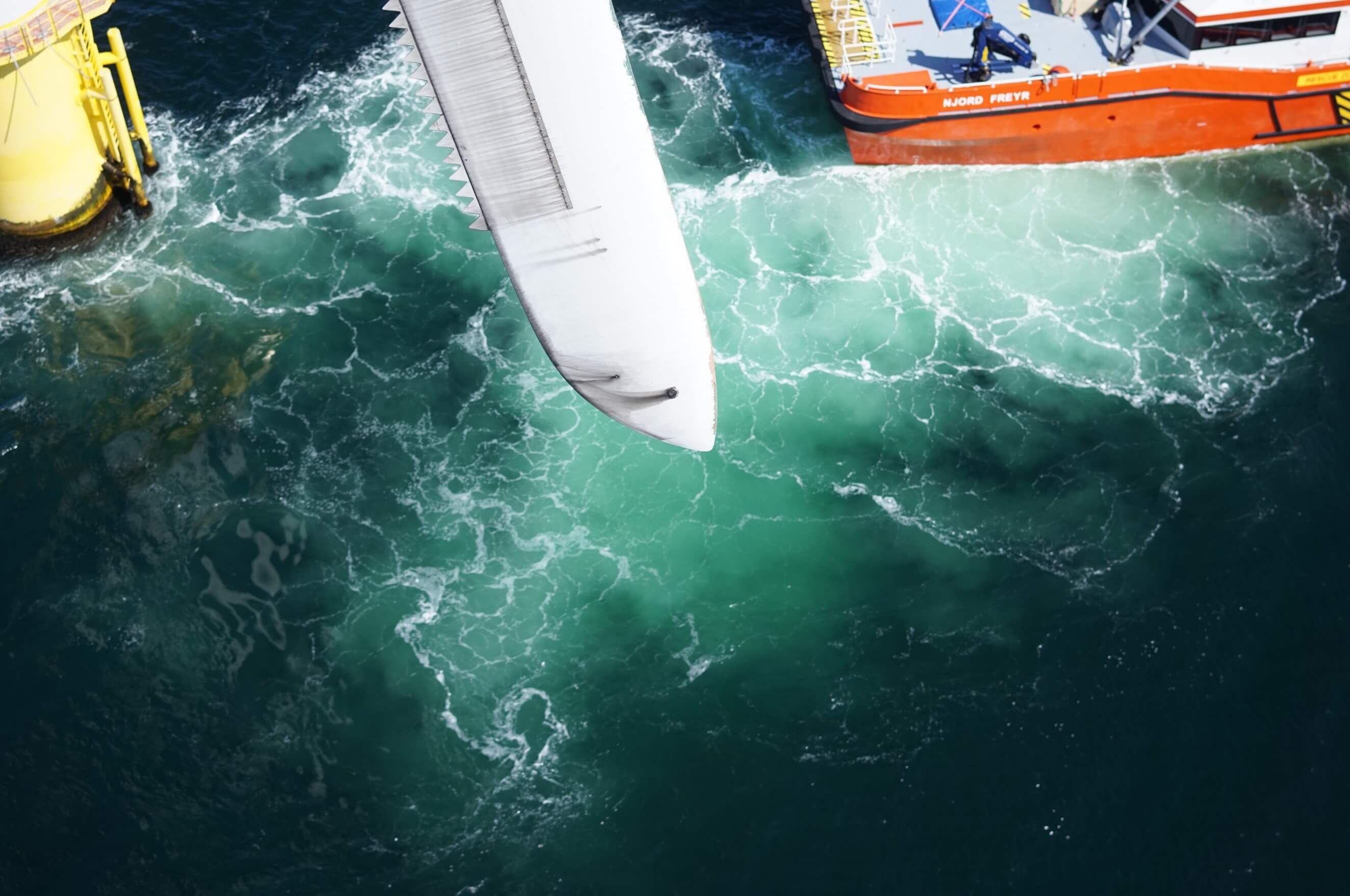 A picture taken from a drone captures clear evidence of erosion on an offshore turbine blade.